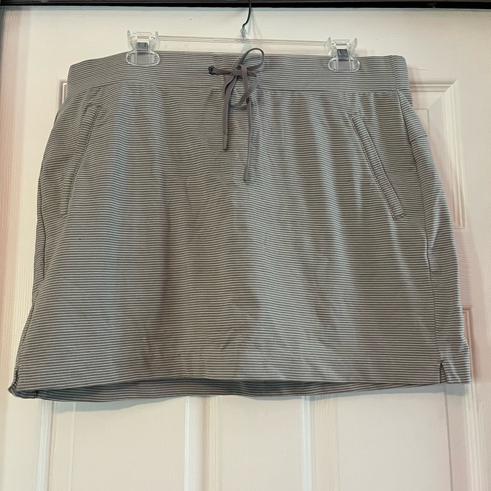 Athleta skort. Grey and white stripe size L